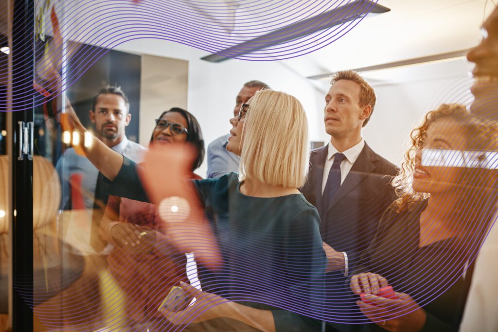 Group of diverse office colleagues brainstorming together with s